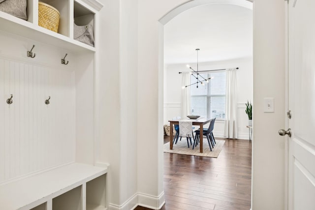 1074 Cantwell Pl, Spring Hill, TN 37174 - mudroom featuring arched walkways, a chandelier, and dark wood-style floors