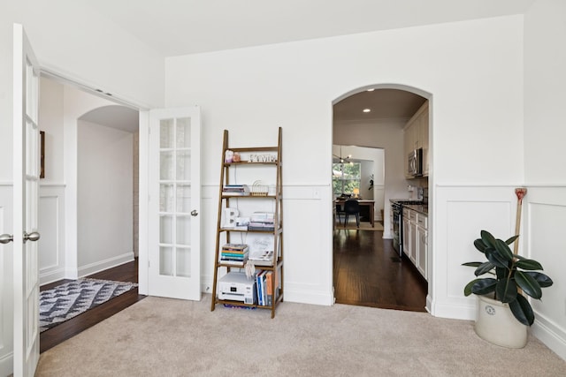 1074 Cantwell Pl, Spring Hill, TN 37174 - hallway featuring arched walkways, carpet flooring, and french doors