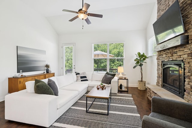 1074 Cantwell Pl, Spring Hill, TN 37174 - living area featuring dark wood-style flooring, a stone fireplace, healthy amount of natural light, baseboards, and high vaulted ceiling
