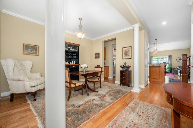 2342 N Tennessee Blvd Unit 601, Murfreesboro, TN 37130 - dining space featuring ornate columns, light wood finished floors, crown molding, and baseboards