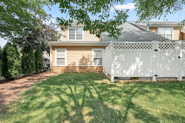 2342 N Tennessee Blvd Unit 601, Murfreesboro, TN 37130 - rear view of house with a shingled roof and stone siding