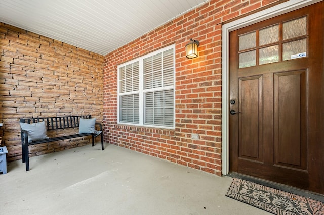 2342 N Tennessee Blvd Unit 601, Murfreesboro, TN 37130 - doorway to property with brick siding and a porch