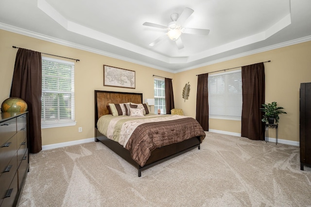 2342 N Tennessee Blvd Unit 601, Murfreesboro, TN 37130 - bedroom with a tray ceiling, light carpet, multiple windows, baseboards, and crown molding