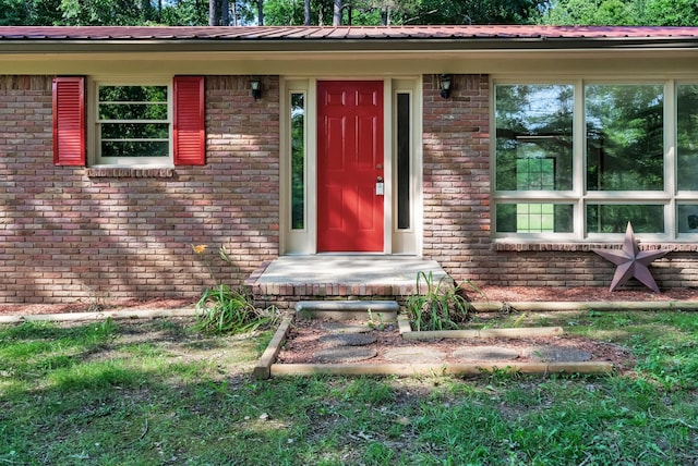 5595 Denmark Rd, Erin, TN 37061 - property entrance featuring brick siding and metal roof