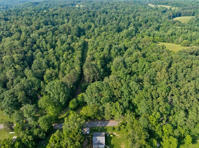 5595 Denmark Rd, Erin, TN 37061 - aerial overview of property's location featuring a heavily wooded area