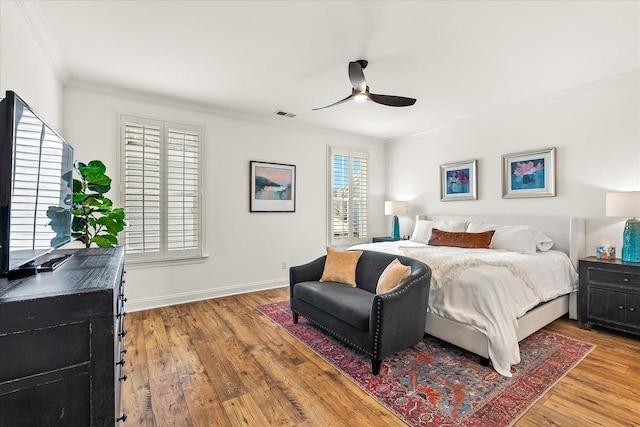 3205 Vinemont Dr, Thompsons Station, TN 37179 - bedroom with ornamental molding, wood finished floors, baseboards, and a ceiling fan