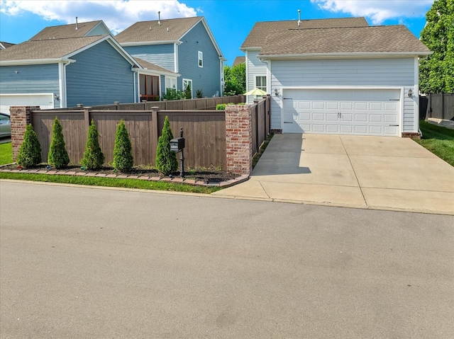 3205 Vinemont Dr, Thompsons Station, TN 37179 - traditional home with a garage and a shingled roof