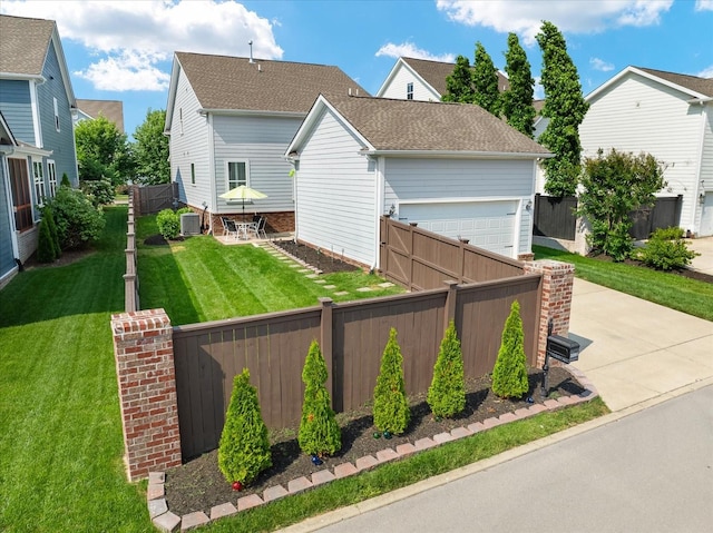 3205 Vinemont Dr, Thompsons Station, TN 37179 - view of front of property featuring driveway, a garage, and central AC