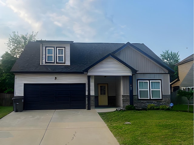 314 Crusaw Dr, Clarksville, TN 37043 - view of front facade with driveway, a garage, and stone siding