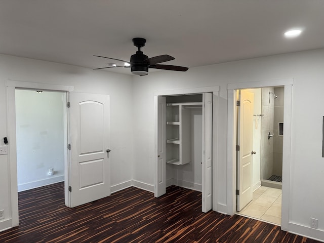 414 Washington St, Columbia, TN 38401 - unfurnished bedroom with wood finished floors, a closet, recessed lighting, baseboards, and ensuite bathroom