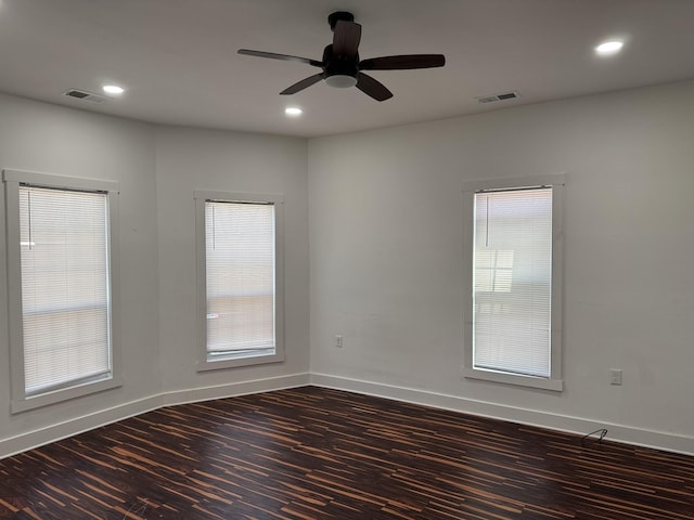 414 Washington St, Columbia, TN 38401 - unfurnished room with dark wood finished floors, baseboards, a ceiling fan, and recessed lighting