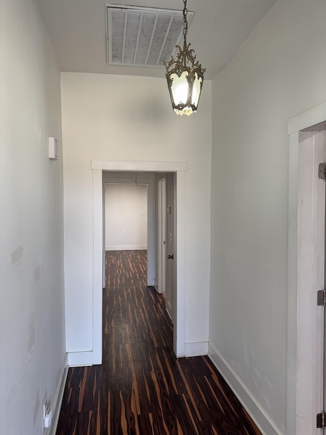 414 Washington St, Columbia, TN 38401 - hall featuring dark wood-style floors and baseboards