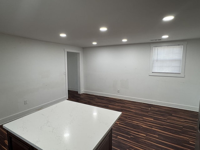 414 Washington St, Columbia, TN 38401 - below grade area featuring baseboards, recessed lighting, and dark wood-type flooring