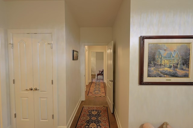 307 Seven Springs Way Unit 304, Brentwood, TN 37027 - hallway with baseboards and dark wood-type flooring