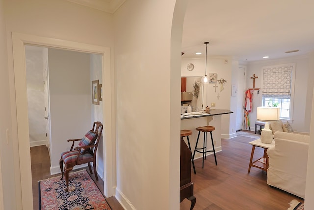307 Seven Springs Way Unit 304, Brentwood, TN 37027 - hall with ornamental molding, dark wood-type flooring, arched walkways, recessed lighting, and baseboards