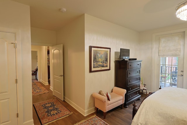 307 Seven Springs Way Unit 304, Brentwood, TN 37027 - bedroom with dark wood-style floors and baseboards