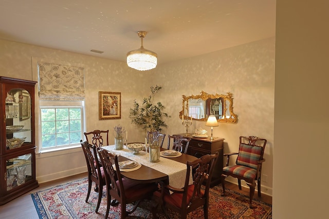 307 Seven Springs Way Unit 304, Brentwood, TN 37027 - dining area featuring baseboards and wood finished floors