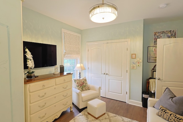 307 Seven Springs Way Unit 304, Brentwood, TN 37027 - bedroom with dark wood finished floors, a closet, and baseboards