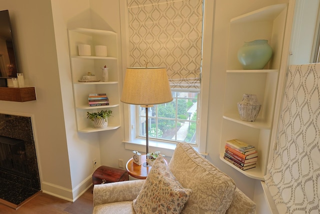 307 Seven Springs Way Unit 304, Brentwood, TN 37027 - sitting room with built in shelves, a premium fireplace, and baseboards
