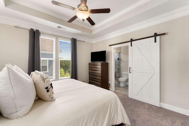 104 Burkitt Commons Ave, Nolensville, TN 37135 - carpeted bedroom with crown molding, a raised ceiling, a barn door, baseboards, and ensuite bath