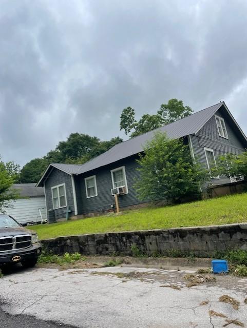 220 Lafayette Ave, Lawrenceburg, TN 38464 - view of front facade featuring cooling unit