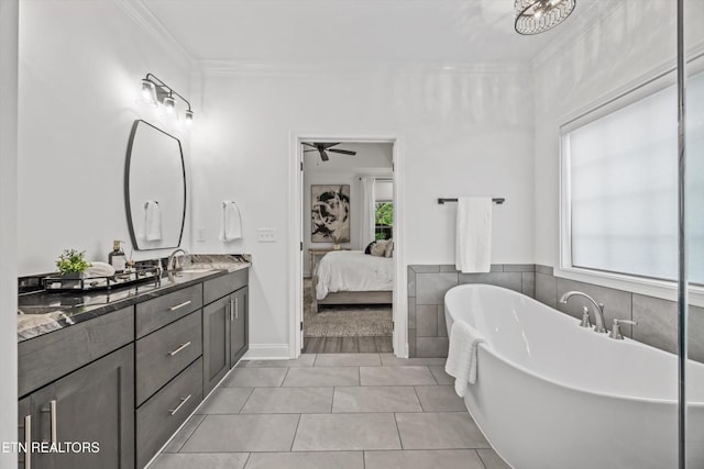 9327 Paradise Valley Ln, Knoxville, TN 37922 - ensuite bathroom featuring vanity, a freestanding tub, crown molding, and ceiling fan
