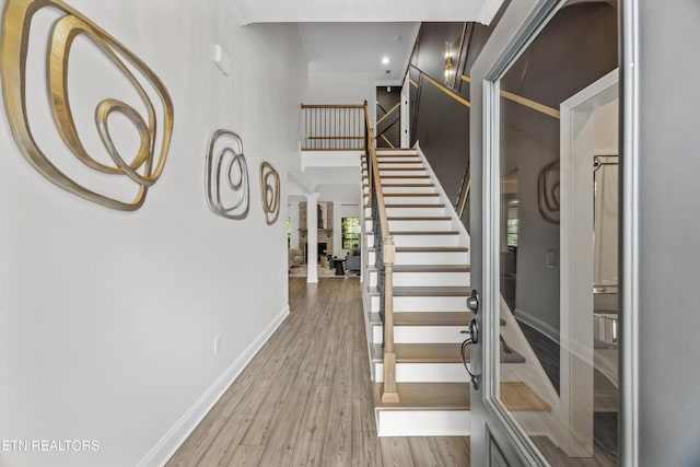 9327 Paradise Valley Ln, Knoxville, TN 37922 - stairs with wood finished floors and recessed lighting