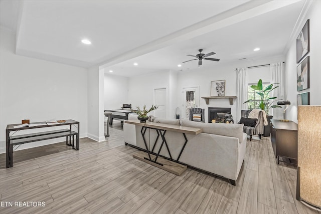 9327 Paradise Valley Ln, Knoxville, TN 37922 - living area with light wood-style floors, recessed lighting, ceiling fan, and a glass covered fireplace