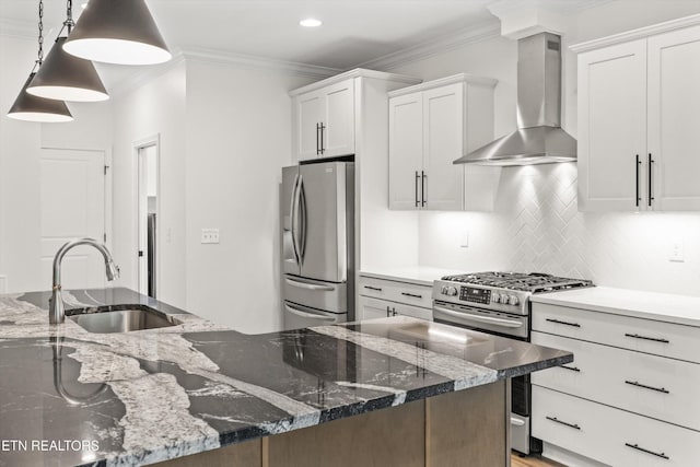 9327 Paradise Valley Ln, Knoxville, TN 37922 - kitchen featuring stainless steel appliances, wall chimney range hood, white cabinets, tasteful backsplash, and ornamental molding