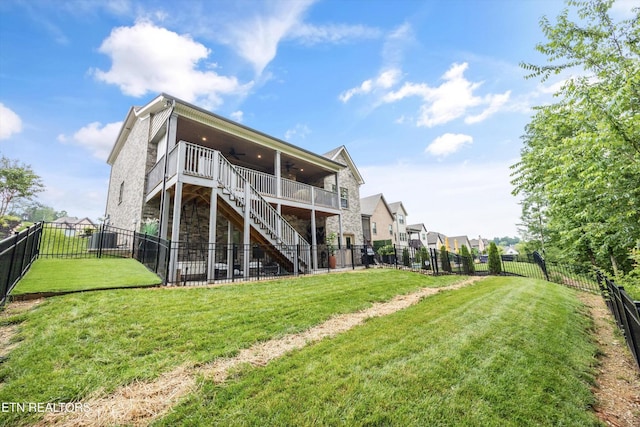 9327 Paradise Valley Ln, Knoxville, TN 37922 - rear view of house featuring a ceiling fan, stone siding, a fenced backyard, and stairs