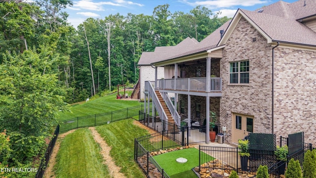 9327 Paradise Valley Ln, Knoxville, TN 37922 - rear view of property featuring stairway, brick siding, a fenced backyard, a patio, and a deck