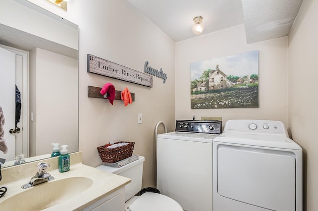 213 Cedarwood Ln, Madison, TN 37115 - bathroom featuring washer and clothes dryer, toilet, and vanity