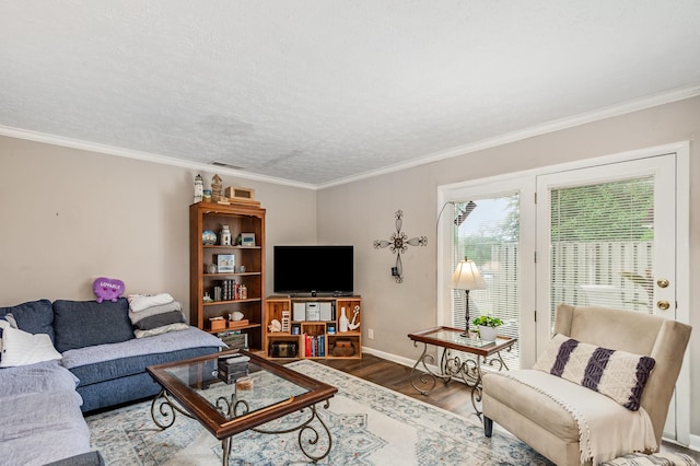 213 Cedarwood Ln, Madison, TN 37115 - living area with wood finished floors, ornamental molding, and baseboards