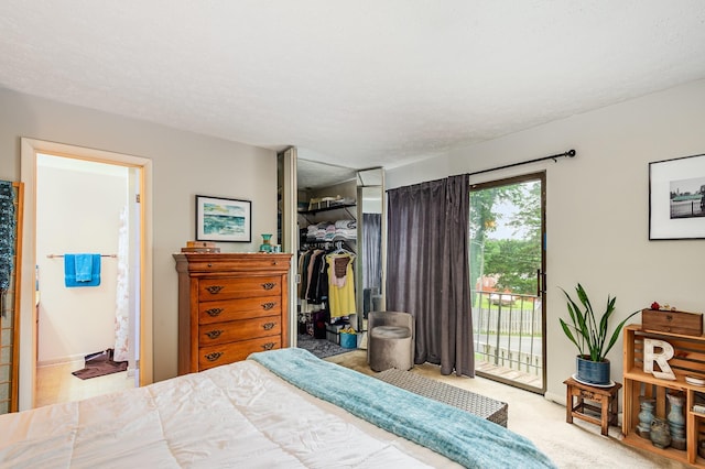 213 Cedarwood Ln, Madison, TN 37115 - carpeted bedroom featuring access to outside, a walk in closet, a closet, and ensuite bathroom