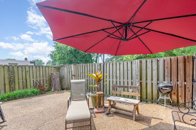 213 Cedarwood Ln, Madison, TN 37115 - fenced backyard featuring a patio