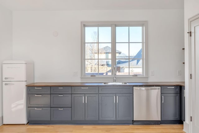 1806 Primrose Ave, Nashville, TN 37212 - kitchen featuring dishwasher, gray cabinetry, a sink, and healthy amount of natural light