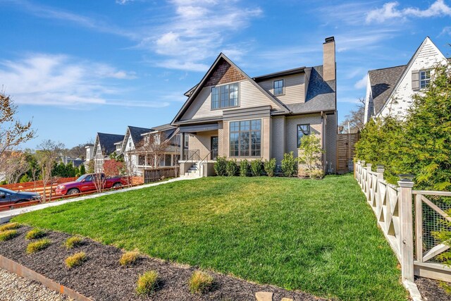 1806 Primrose Ave, Nashville, TN 37212 - view of front of home with brick siding, a chimney, and a shingled roof
