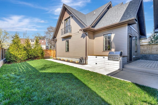 1806 Primrose Ave, Nashville, TN 37212 - rear view of property featuring area for grilling, roof with shingles, a deck, and a patio