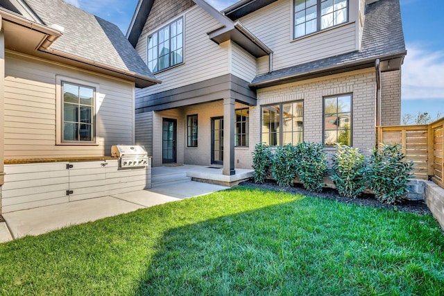 1806 Primrose Ave, Nashville, TN 37212 - rear view of property featuring brick siding and exterior kitchen