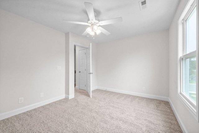 1002 Cherry Acres, Clarksville, TN 37042 - unfurnished bedroom featuring light colored carpet, baseboards, and a ceiling fan