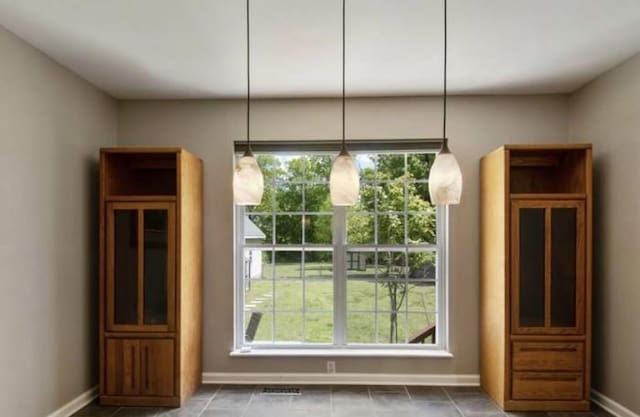 380 Station Dr, Waverly, TN 37185 - unfurnished dining area featuring baseboards