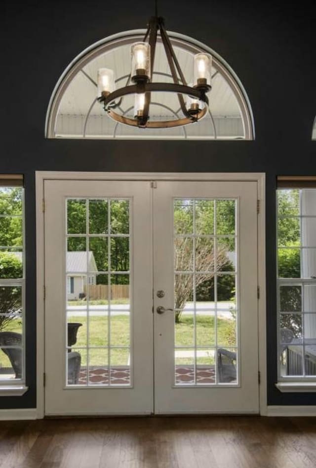 380 Station Dr, Waverly, TN 37185 - doorway to outside featuring a chandelier, french doors, and plenty of natural light