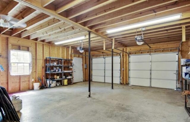 380 Station Dr, Waverly, TN 37185 - garage with a garage door opener