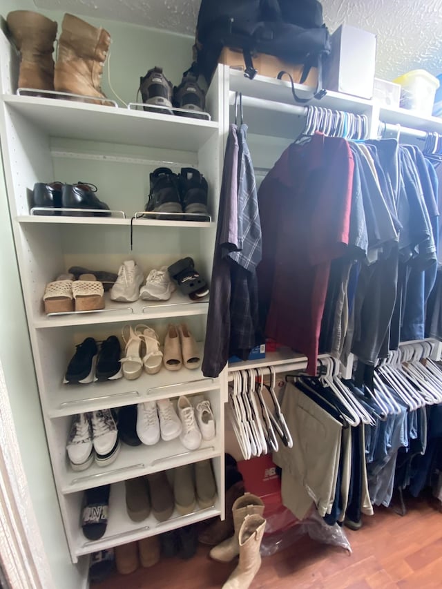 380 Station Dr, Waverly, TN 37185 - spacious closet featuring wood finished floors
