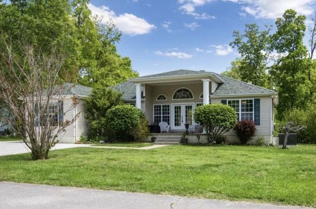 380 Station Dr, Waverly, TN 37185 - view of front of house with french doors and a front lawn