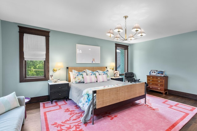 1400 Linden Ave, Nashville, TN 37212 - bedroom with wood finished floors, a chandelier, and baseboards