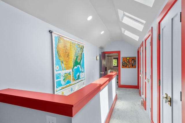 1400 Linden Ave, Nashville, TN 37212 - hall featuring a skylight, vaulted ceiling, light carpet, recessed lighting, and baseboards
