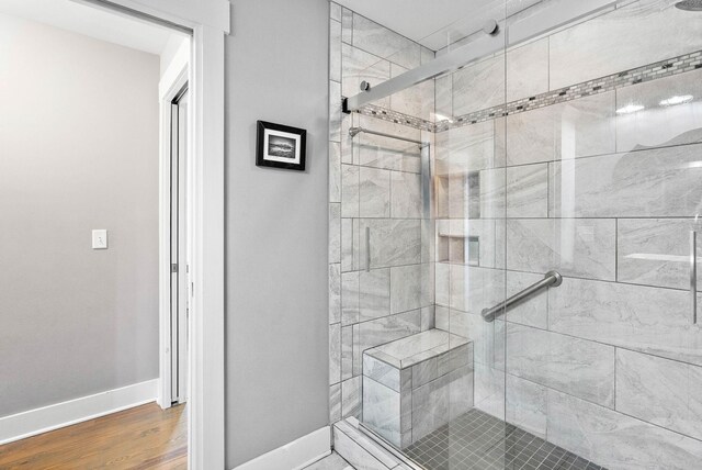 1400 Linden Ave, Nashville, TN 37212 - full bath featuring a stall shower, baseboards, and wood finished floors