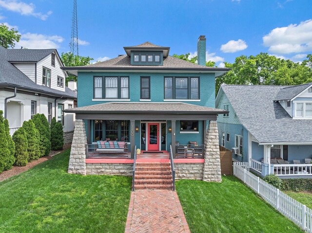 1400 Linden Ave, Nashville, TN 37212 - american foursquare style home with a chimney, covered porch, and roof with shingles