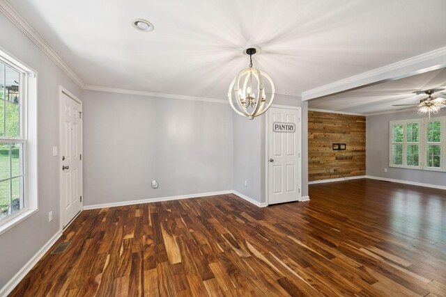 2408 Cantor Way, Spring Hill, TN 37174 - unfurnished living room featuring a chandelier, baseboards, dark wood-style flooring, and crown molding